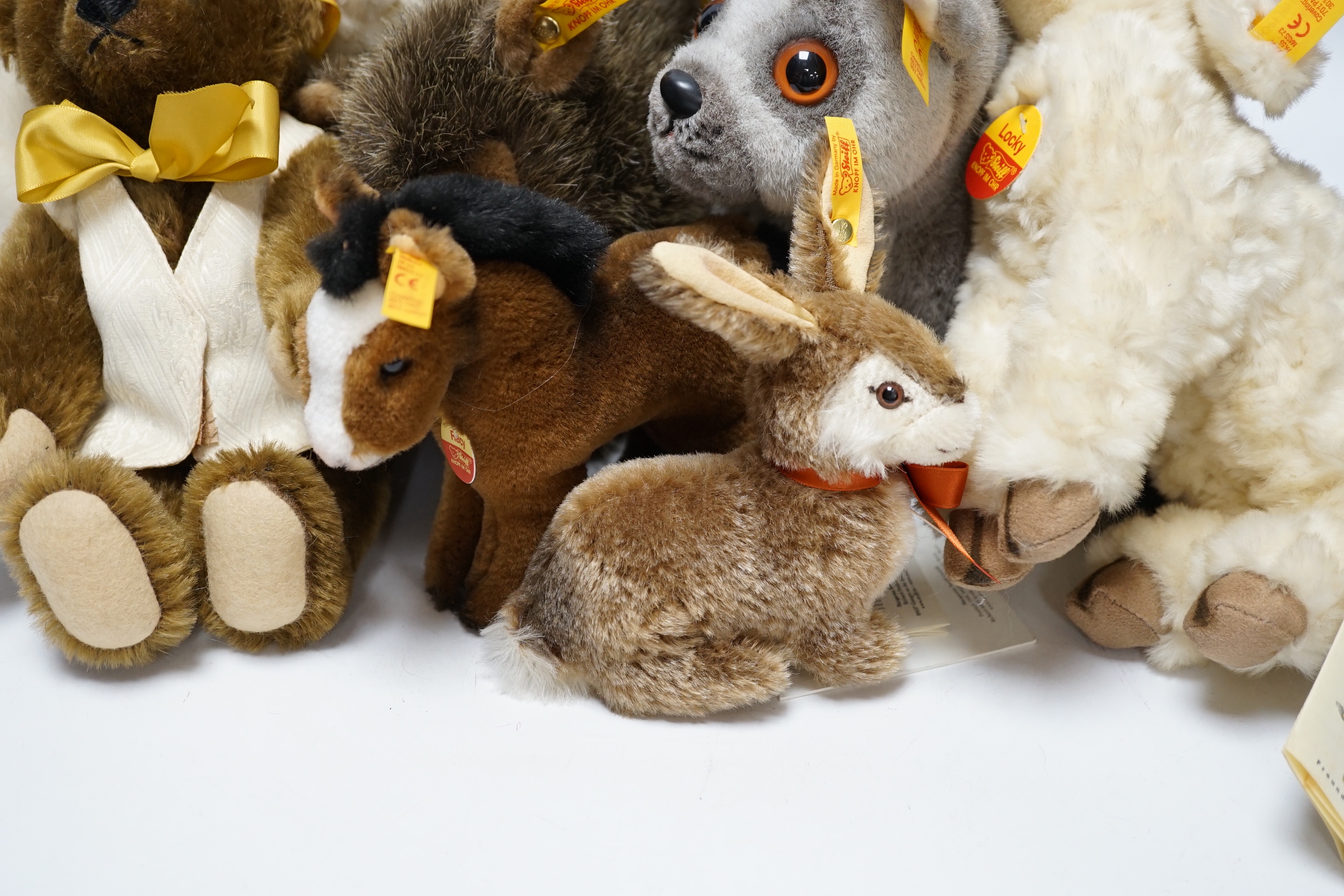 Thirteen Steiff yellow tag animals and one yellow tag bear, including Snorry fox, Mannie rabbit, Nagy beaver and Resi cow